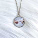 Da Vinci Touching Fingers Glass Necklace