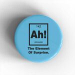 Ah! The Element of Surprise Badge/Magnet